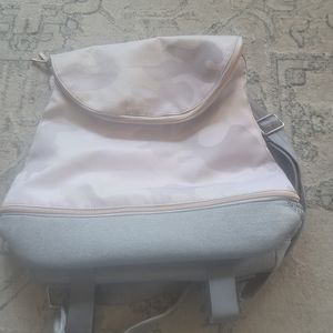 StellaDot camouflage backpack purse. Has a zipper bottom. Lots of room.